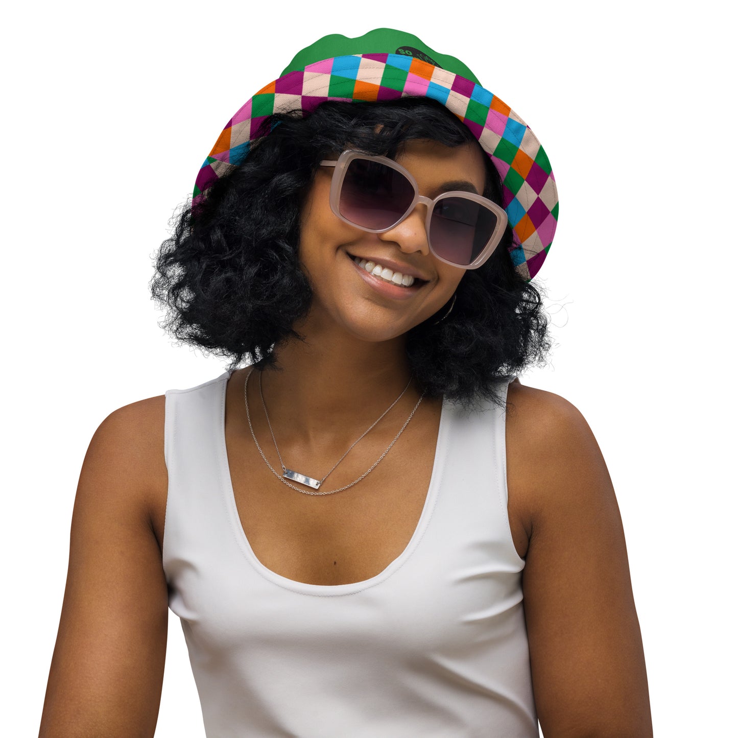 woman-wearing-colorful-chess-bucket-hat-reversible-green-inside
